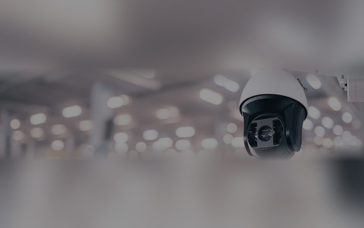 Dome security camera mounted on a ceiling